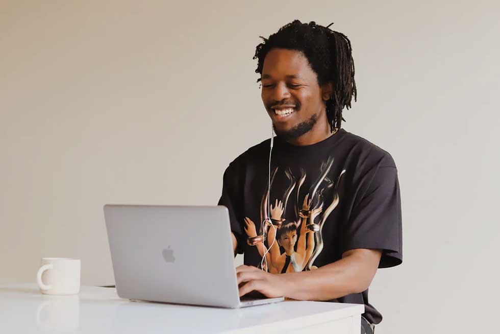 Man working remotely at his computer