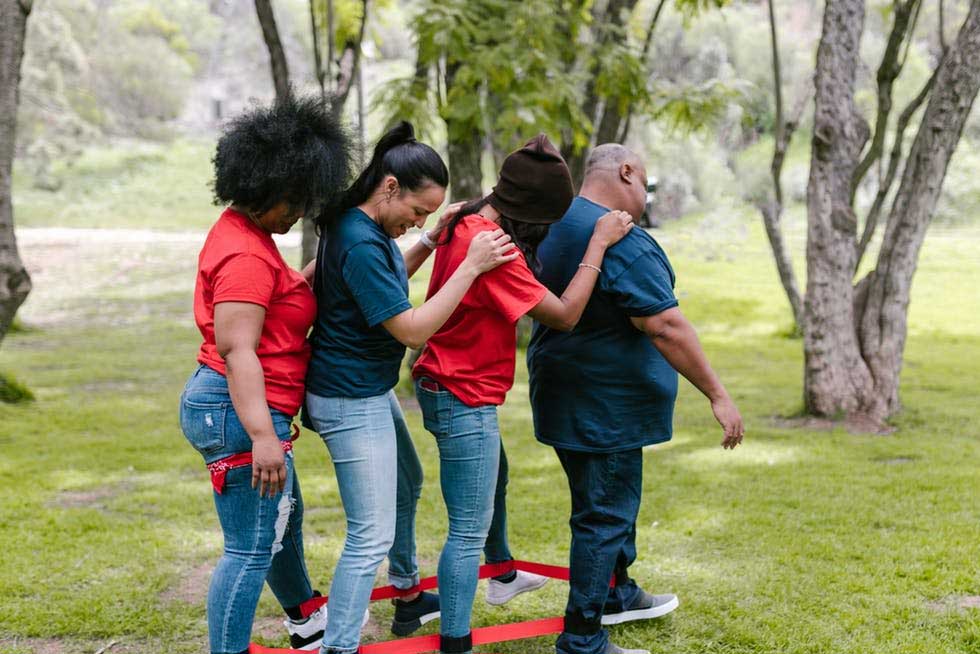 A group of employees playing an amazing race game