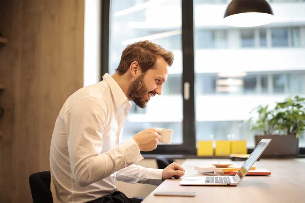 An employee making a training for remote employees fun