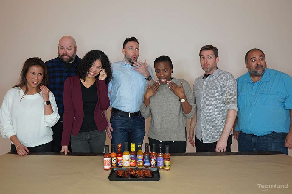 Picture of group of people in team building for Teamland Hot Ones hot sauce event