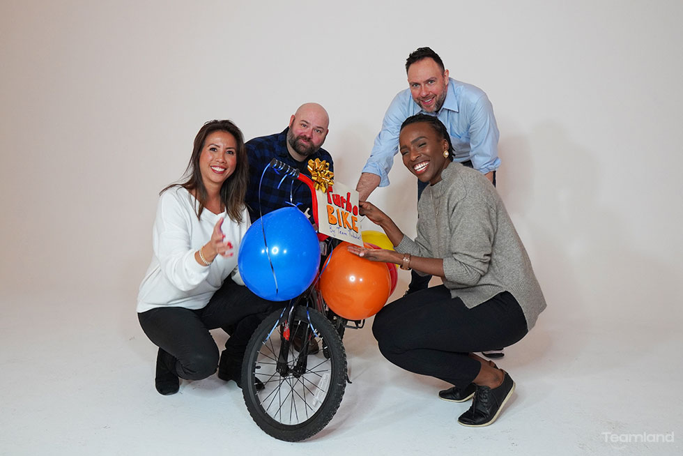 picture of a group building a bike for donation as part of teambuilding
