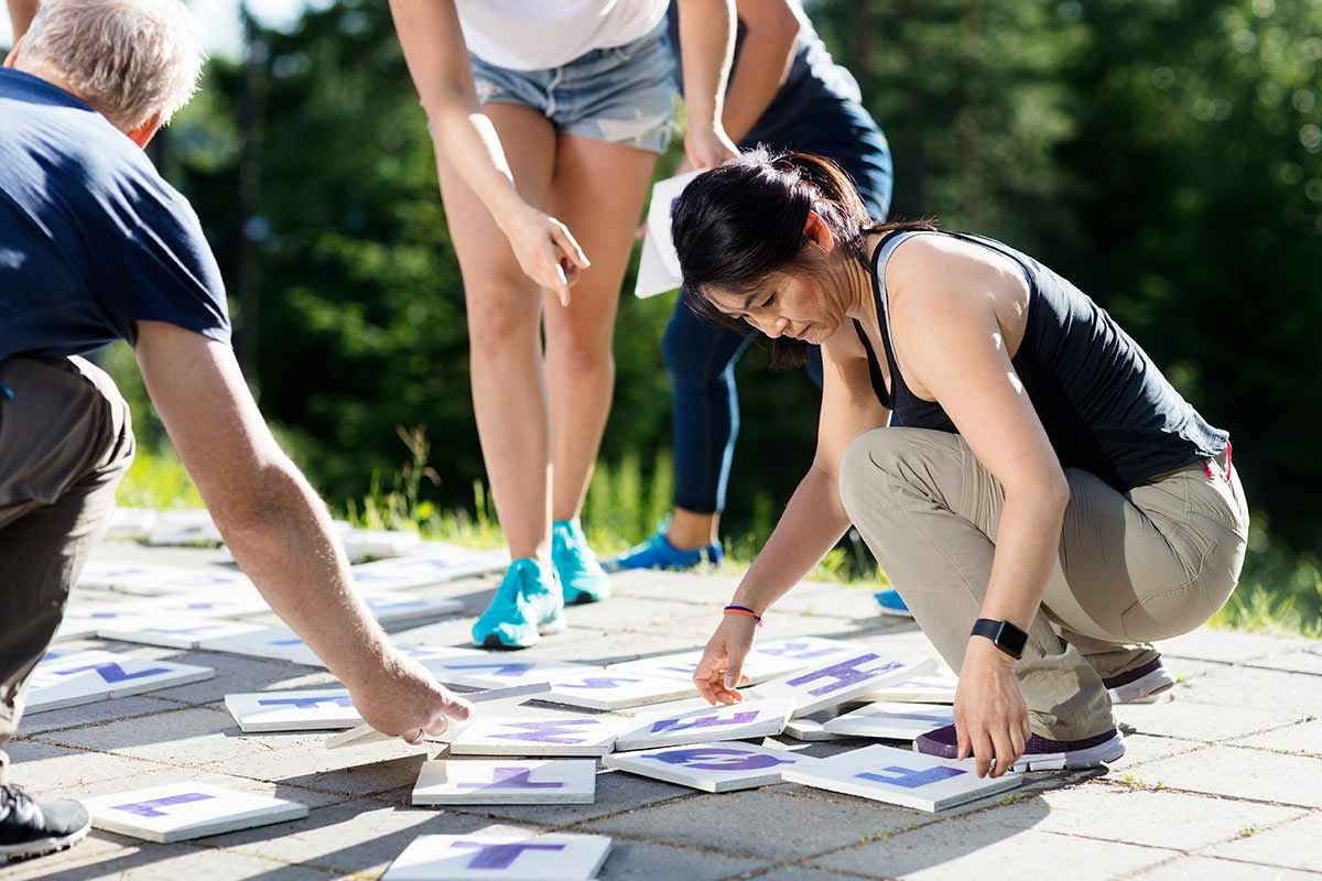 Group doing outdoor team building activity