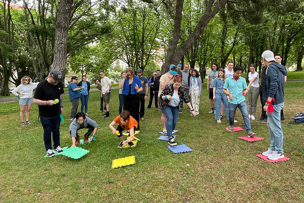 Group of people playing Teamland Silly Games team building activity