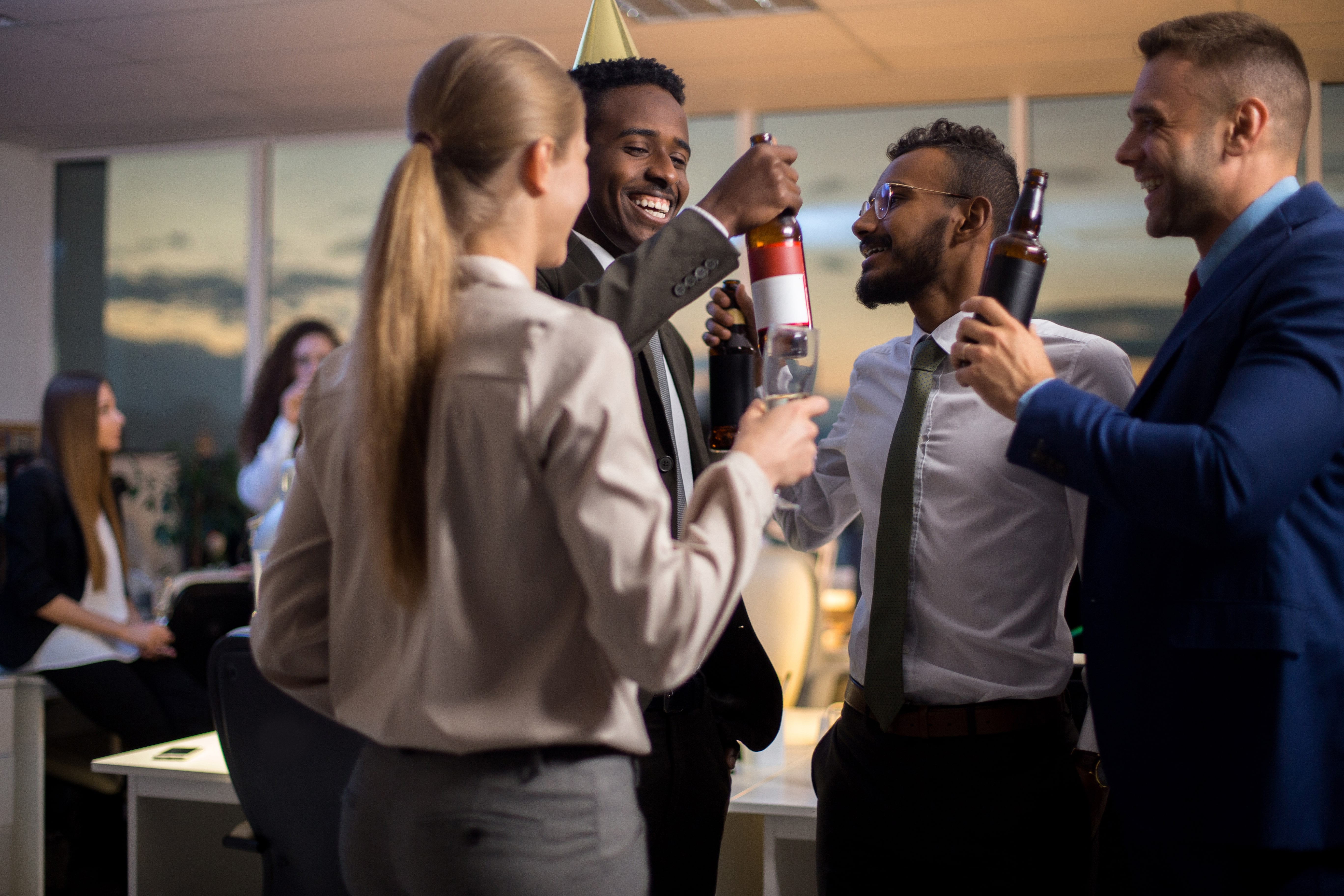 Colleagues drinking at the office