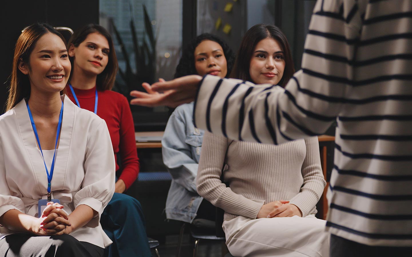 A group of people participating in Teamland DEI workshop
