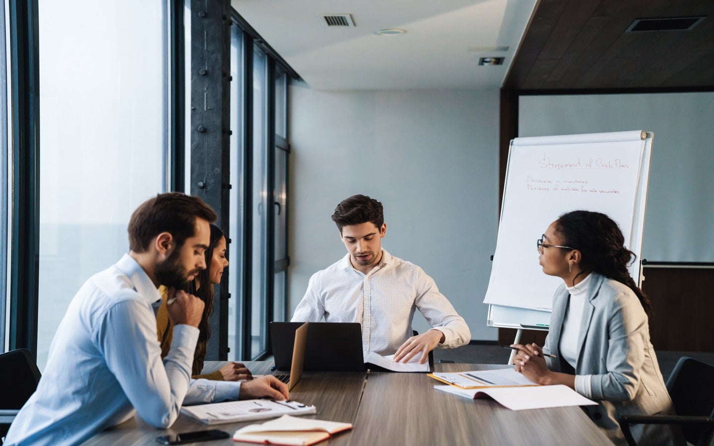 A group of people participating in Teamland AI First workshop