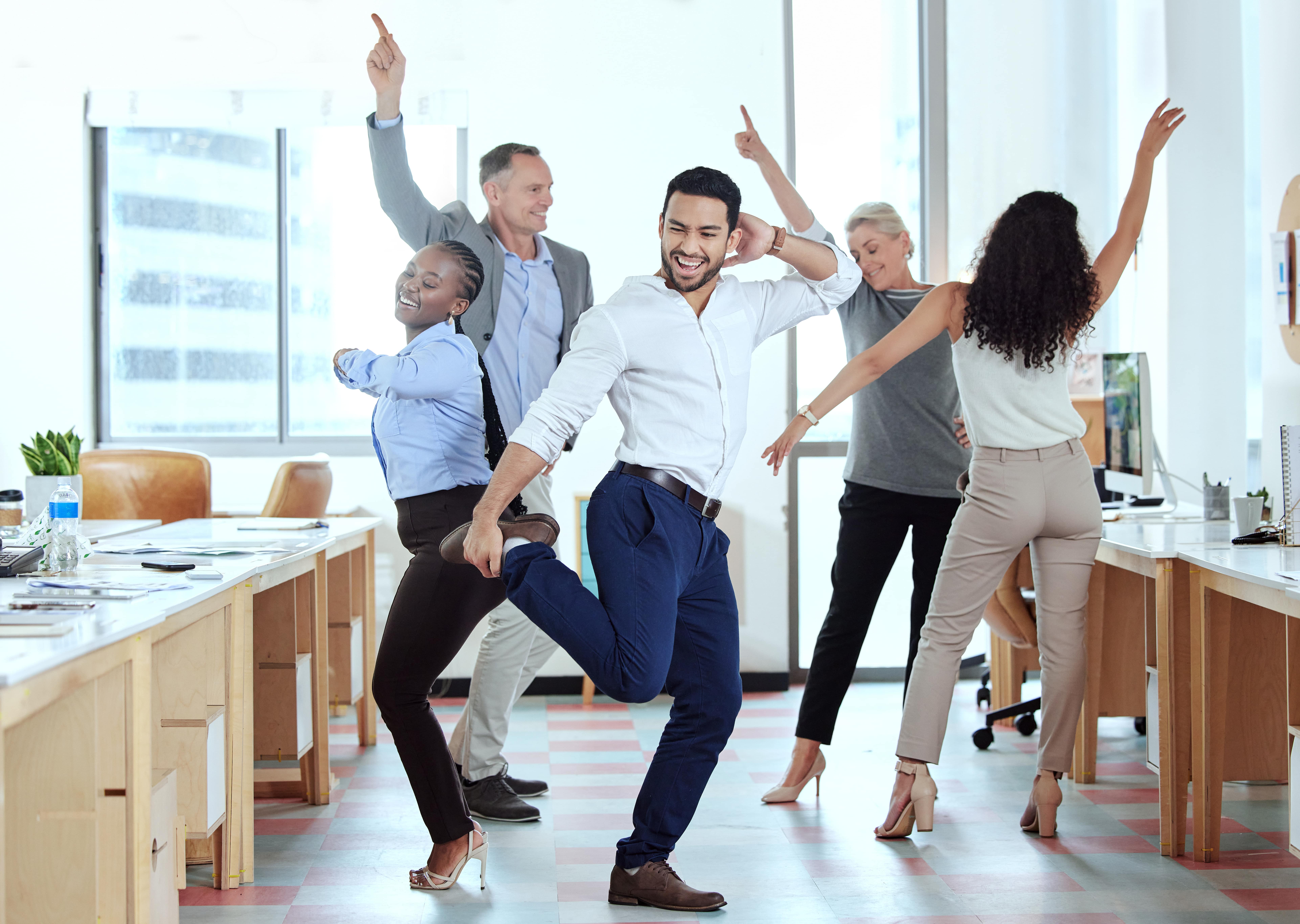 Business people dancing in the office