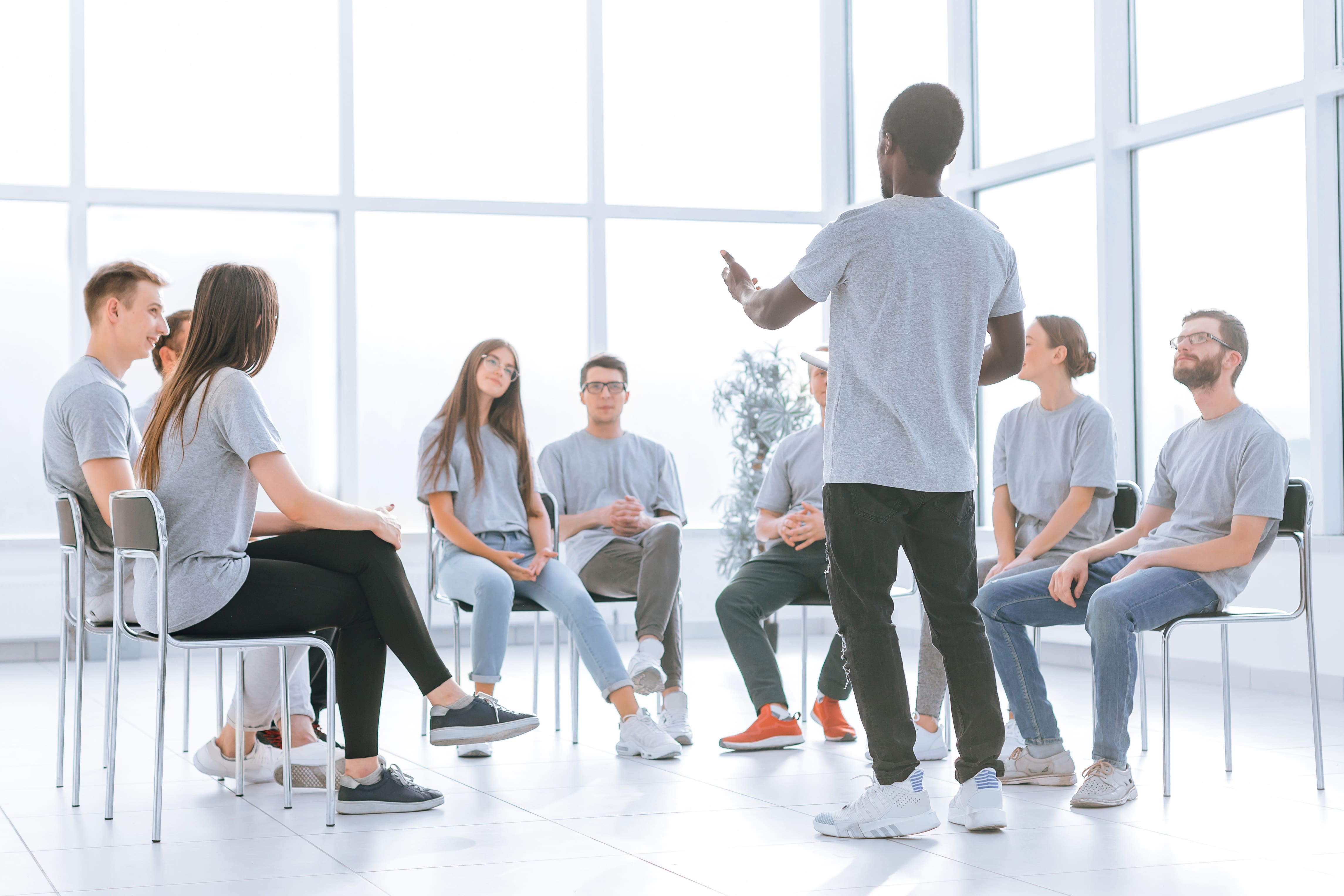 Group of young people listening at a business training.