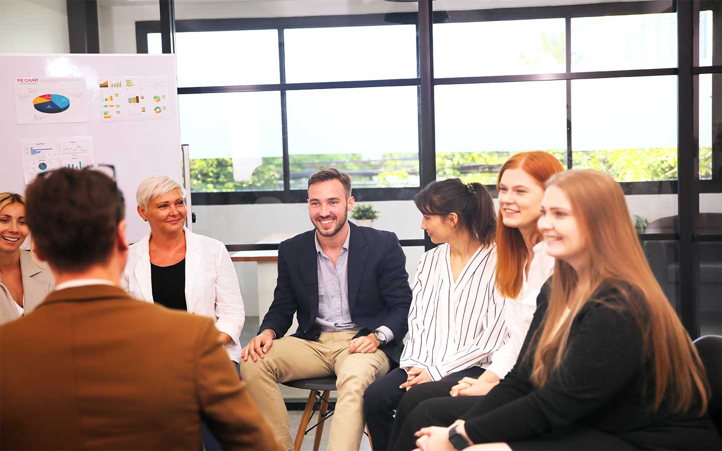 A group of people participating in Teamland Accelerated Selling Mastery workshop